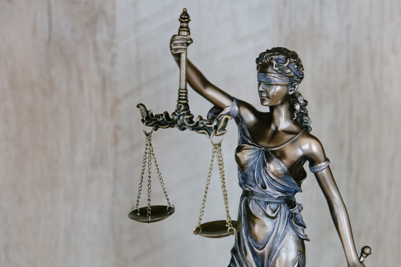 Statue of the goddess of justice holding scales